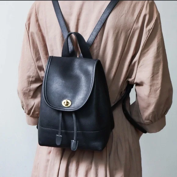 Coach | Bags | 96 Coach Black And Gold Leather Backpack With 